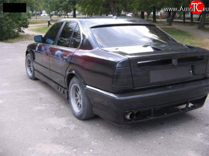 4 999 р. Накладка на задний бампер Rieger  BMW 5 серия  E34 (1988-1994)  с доставкой в г. Калуга