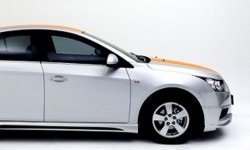 3 999 р. Накладка на передний бампер Extrime  Chevrolet Cruze ( седан,  хэтчбек,  универсал) (2009-2015) (Неокрашенная)  с доставкой в г. Калуга. Увеличить фотографию 2