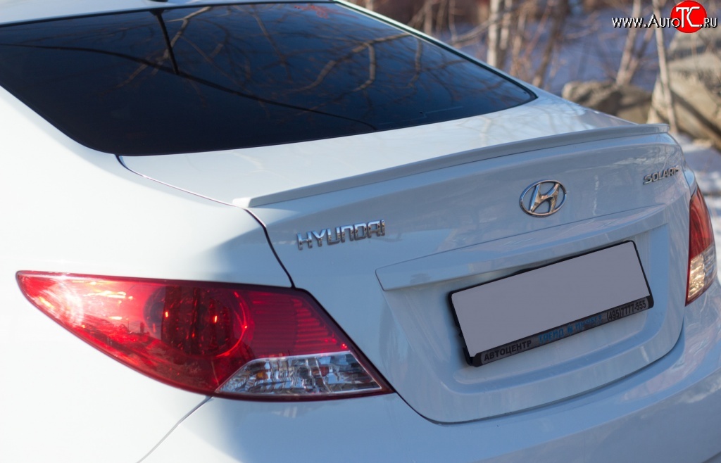 2 989 р. Узкий лип спойлер Drive  Hyundai Solaris  1 седан (2010-2014) (Неокрашенный)  с доставкой в г. Калуга