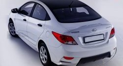 10 999 р. Задний бампер Sport  Hyundai Solaris  1 седан (2010-2014) (Неокрашенный)  с доставкой в г. Калуга. Увеличить фотографию 2