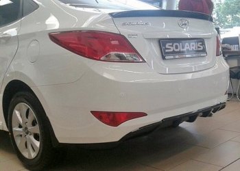 3 899 р. Накладка на задний бампер АвтоКрат  Hyundai Solaris  1 седан (2014-2017) (Неокрашенная)  с доставкой в г. Калуга. Увеличить фотографию 2