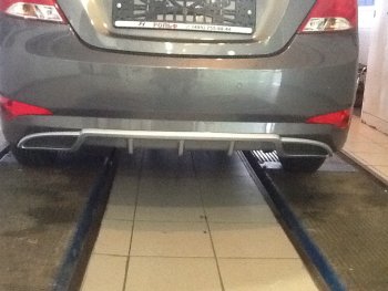 3 899 р. Накладка на задний бампер АвтоКрат  Hyundai Solaris  1 седан (2014-2017) (Неокрашенная)  с доставкой в г. Калуга. Увеличить фотографию 4