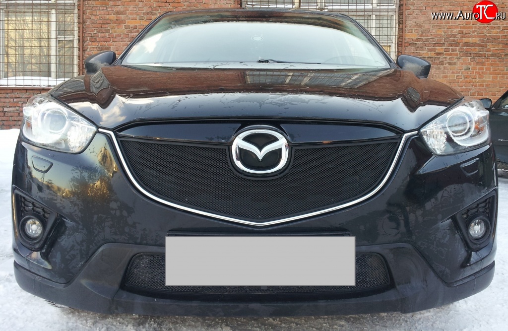 2 299 р. Нижняя сетка на бампер Russtal (черная) Mazda CX-5 KE дорестайлинг (2011-2014)  с доставкой в г. Калуга