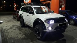 Накладки на колёсные арки BUSHWACKER Mitsubishi Pajero Sport 2 PB дорестайлинг (2008-2013)