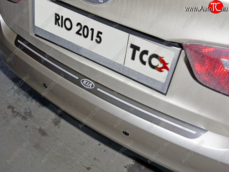 3 099 р. Накладка на задний бампер, ТСС Тюнинг  KIA Rio  3 QB (2015-2017) (лист шлифованный надпись RIO)  с доставкой в г. Калуга