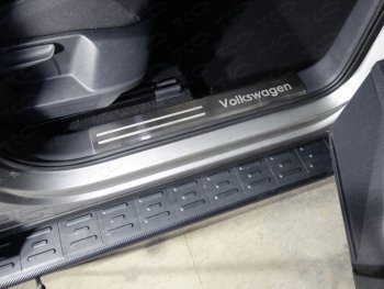 4 099 р. Накладки на пластиковые пороги, ТСС Тюнинг  Volkswagen Tiguan  Mk2 (2016-2020) (лист шлифованный надпись Volkswagen)  с доставкой в г. Калуга. Увеличить фотографию 1