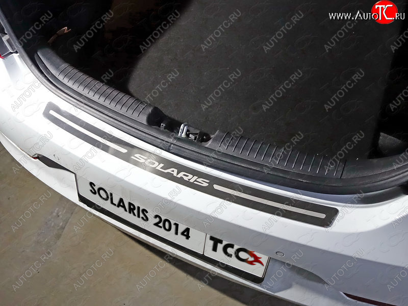 3 899 р. Накладка на задний бампер ТСС Тюнинг  Hyundai Solaris  1 хэтчбэк (2014-2017) (лист шлифованный с надписью Solaris)  с доставкой в г. Калуга