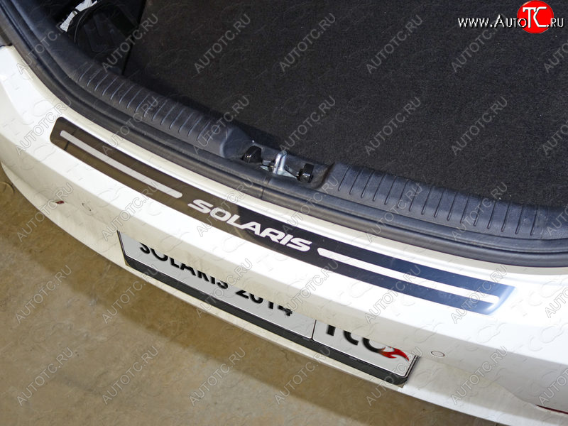 3 899 р. Накладка на задний бампер ТСС Тюнинг  Hyundai Solaris  1 хэтчбэк (2014-2017) (лист зеркальный с надписью Solaris)  с доставкой в г. Калуга