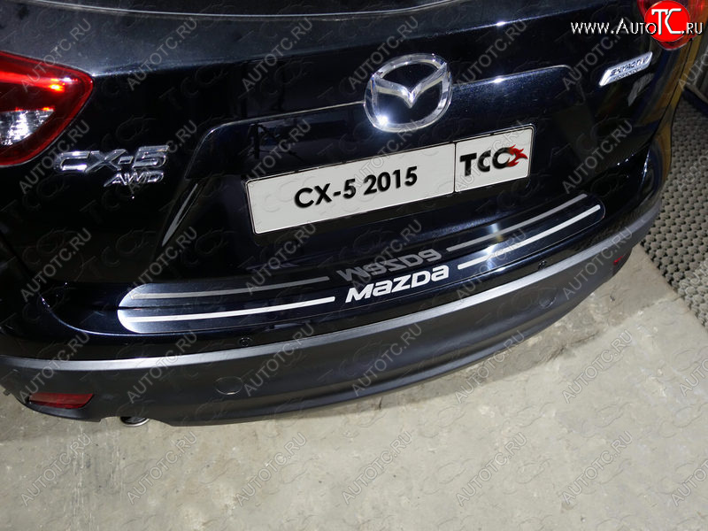 2 499 р. Накладка на задний бампер ТСС Тюнинг  Mazda CX-5  KE (2015-2017) ( лист зеркальный надпись MAZDA)  с доставкой в г. Калуга