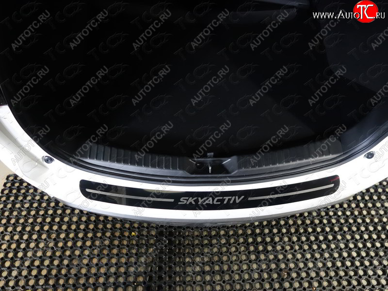 3 499 р. Накладка на задний бампер ТСС Тюнинг  Mazda CX-5  KF (2016-2024) (лист зеркальный надпись SKYACTIV)  с доставкой в г. Калуга