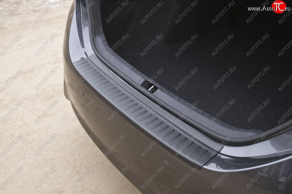 1 129 р. Защитная накладка на задний бампер RA  Toyota Corolla  E180 (2013-2019)  с доставкой в г. Калуга